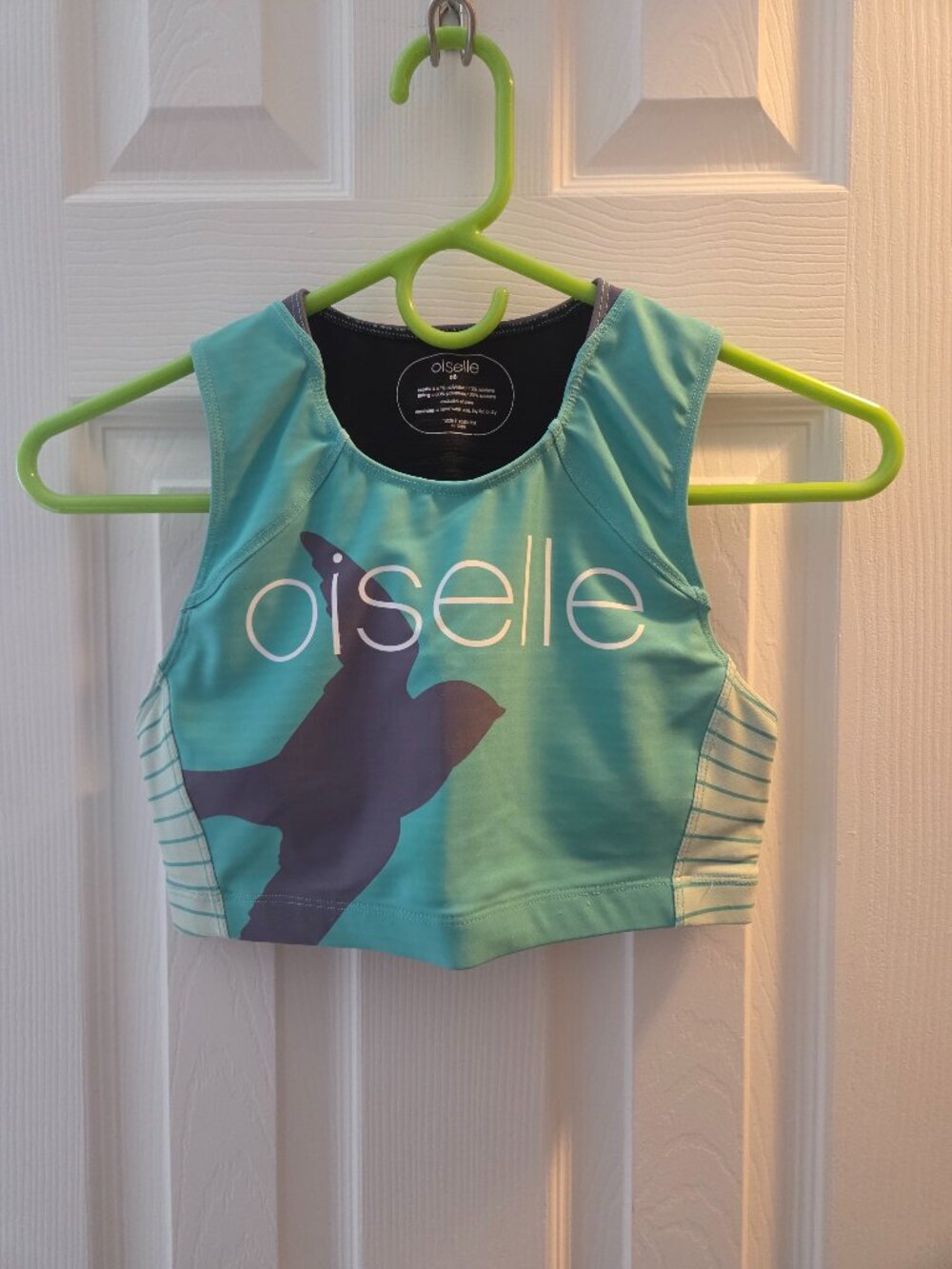 Oiselle original teal bird design crop with bra pads, size 6